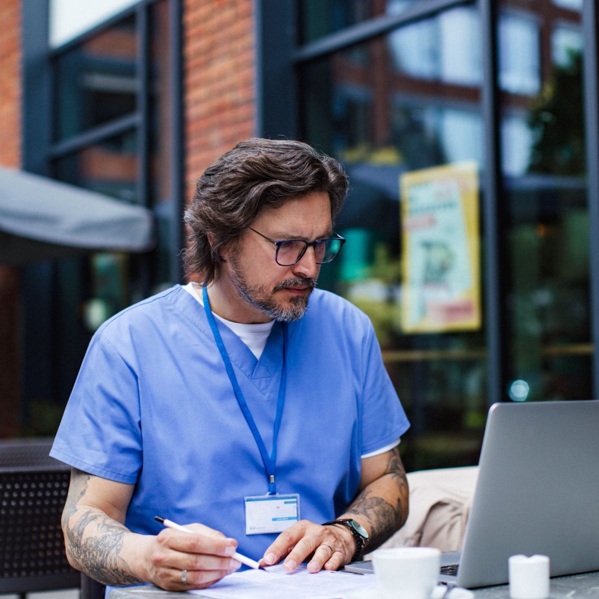 a person looking at a laptop